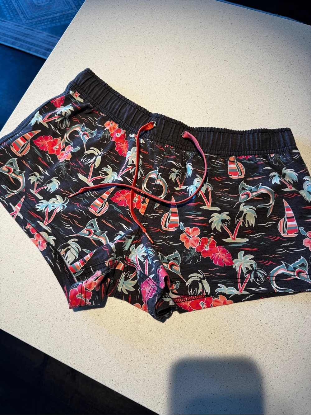 Salt Life Black Floral Athletic Shorts with Red and Teal Accents